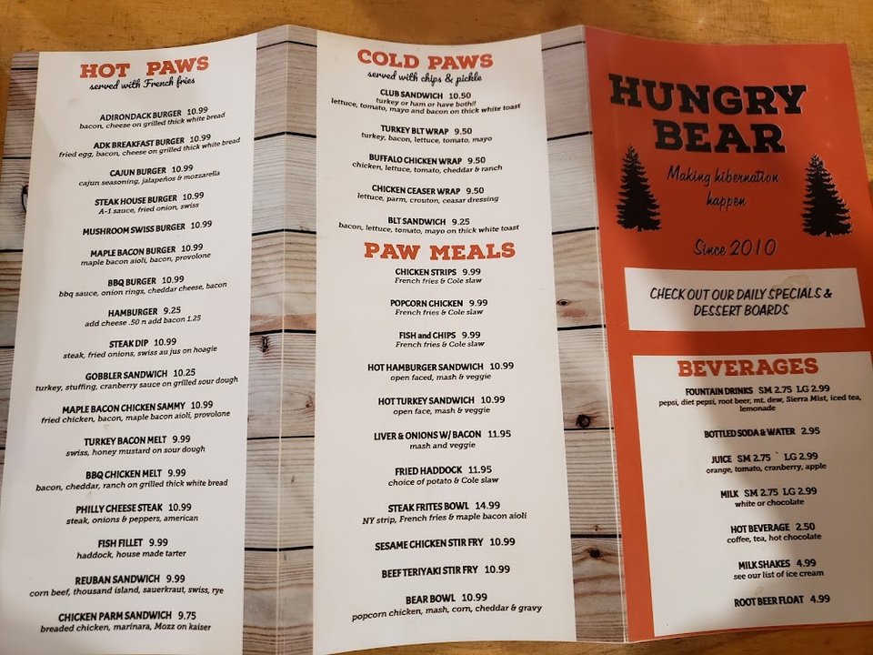 Menu board with breakfast and lunch choices.